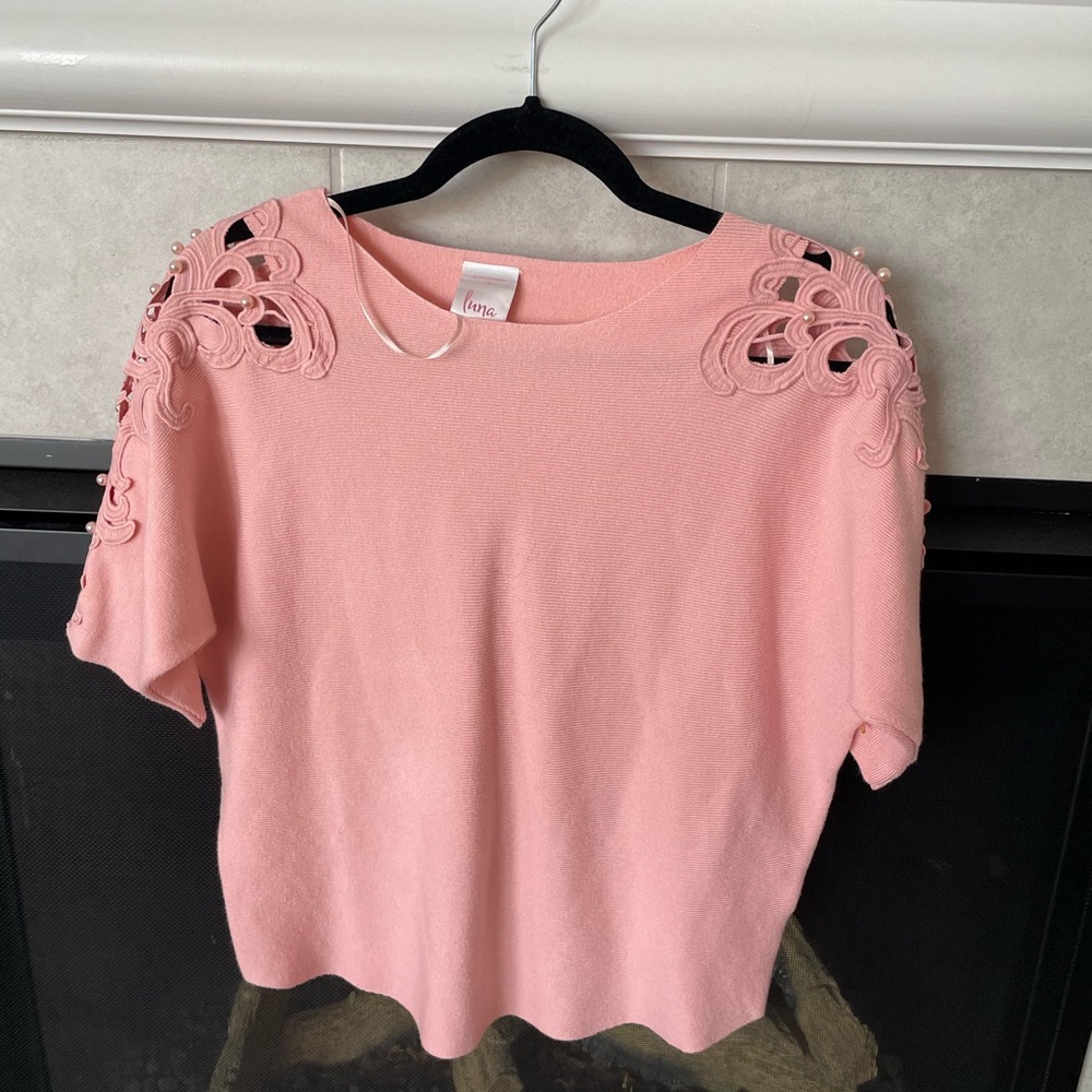 Luna blouse with pearl like studs on sleeves.